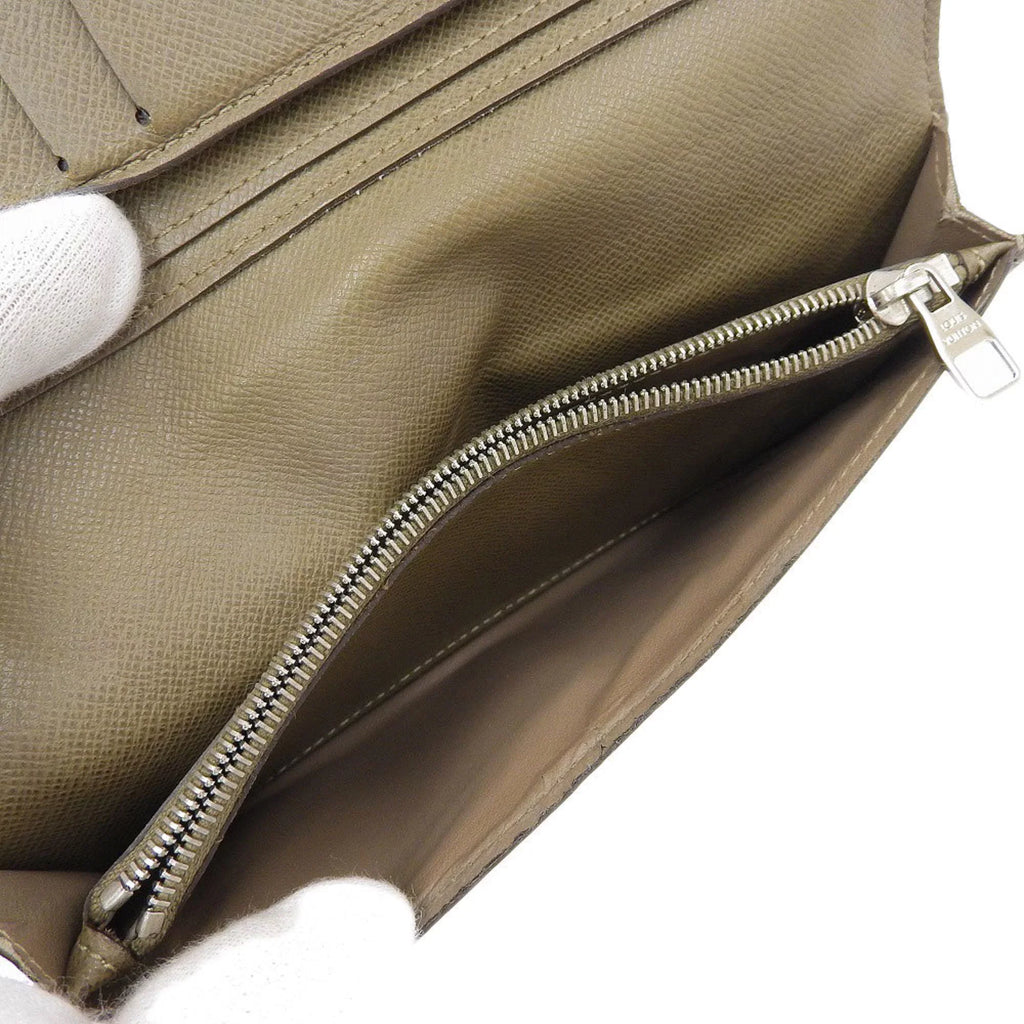 Stylish Pre-Owned Louis Vuitton LOUIS VUITTON Taiga Portefeuille Brother Bifold Long Wallet Ural M32807 (Good)